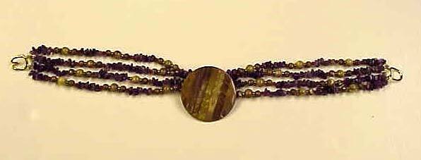 4 strands of amethyst & cinnabar with polished wood necklace