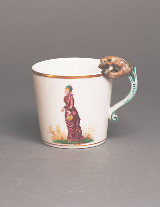 Mug with grotesque handle